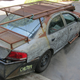 Illustration for article titled How To Turn A Chrysler Sebring Into A Mad Max Road Warrior